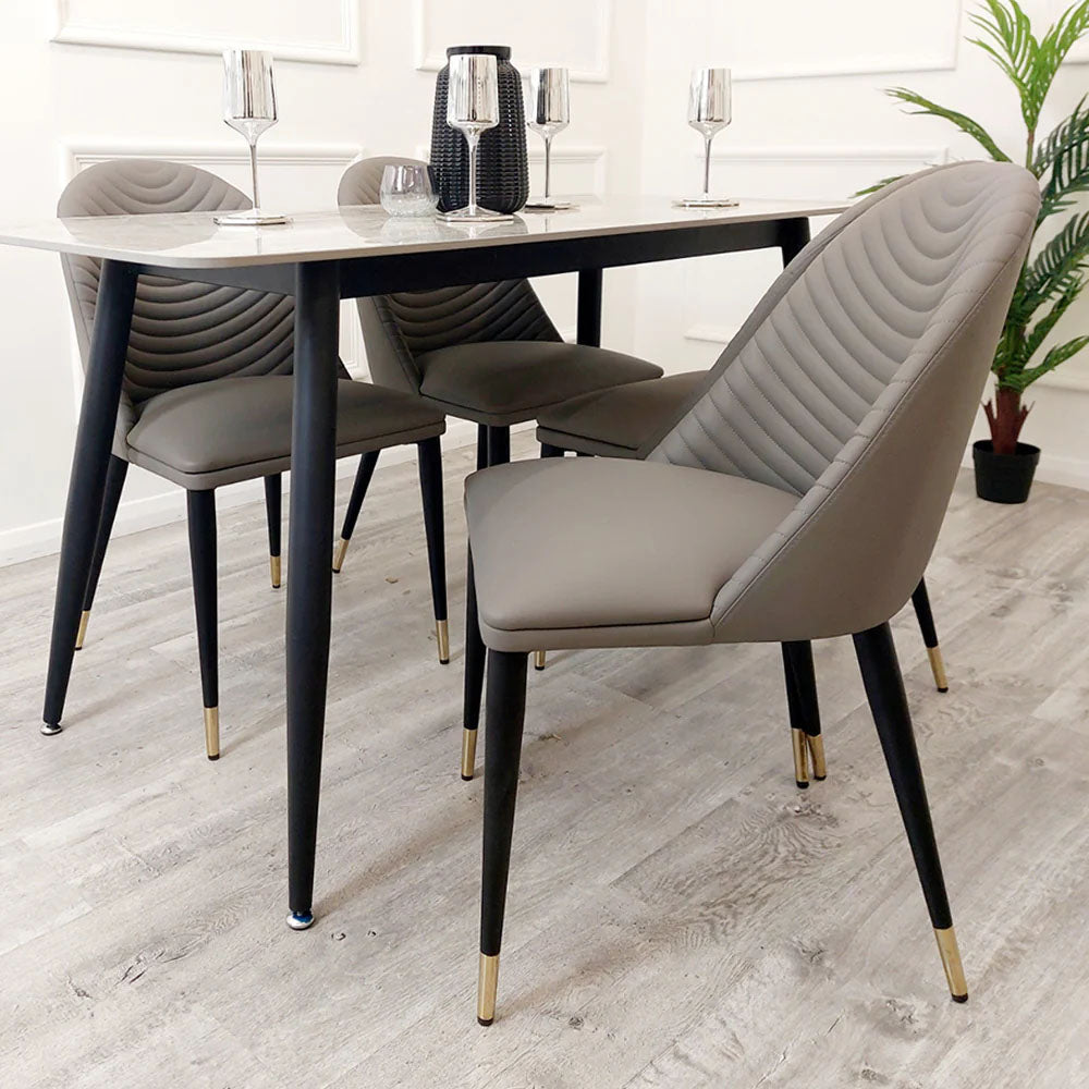 Dining Chair Size in mm: W 47 x H 85 x D 57 cm Premium High Quality Material - UK Fire Resistant Tested Ribbed style Stitching Back Design High Quality Black Scandinavian style legs Delivery in 7-10 working days